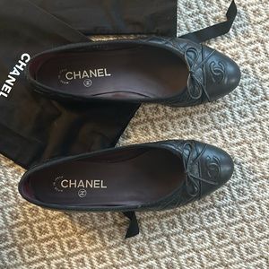 Black quilted Chanel flats
